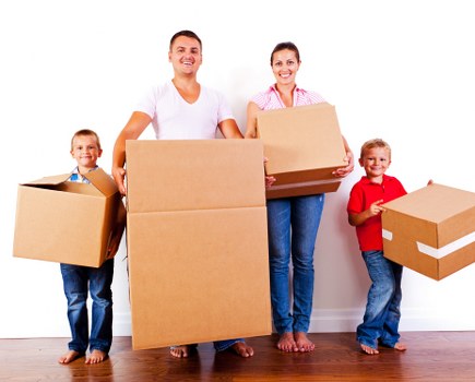 Professional home moving service in Westminster with residential property backdrop