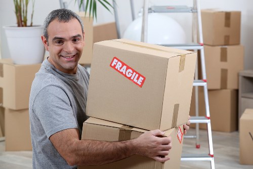 House removal team planning a move in Westminster street