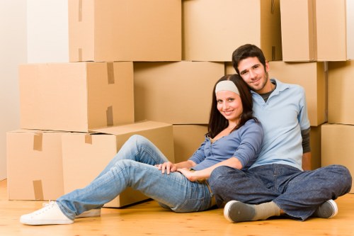Local office relocation team handling boxes and equipment in central Westminster