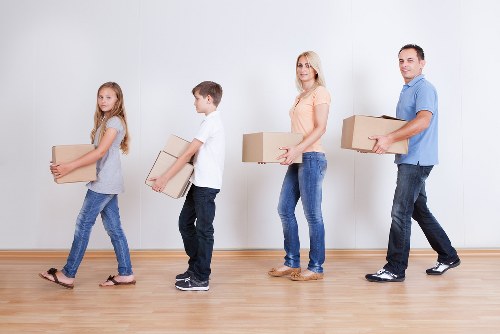 Residential removals support for a flat move in Westminster with boxes and protective wrapping