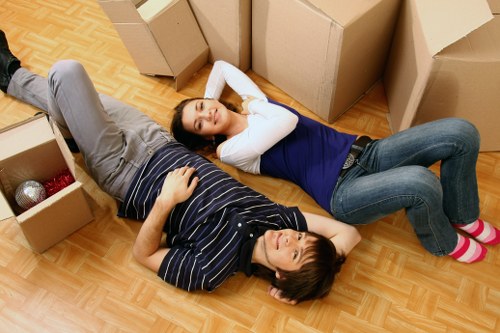 A local team unpacking and arranging items in a new Westminster property